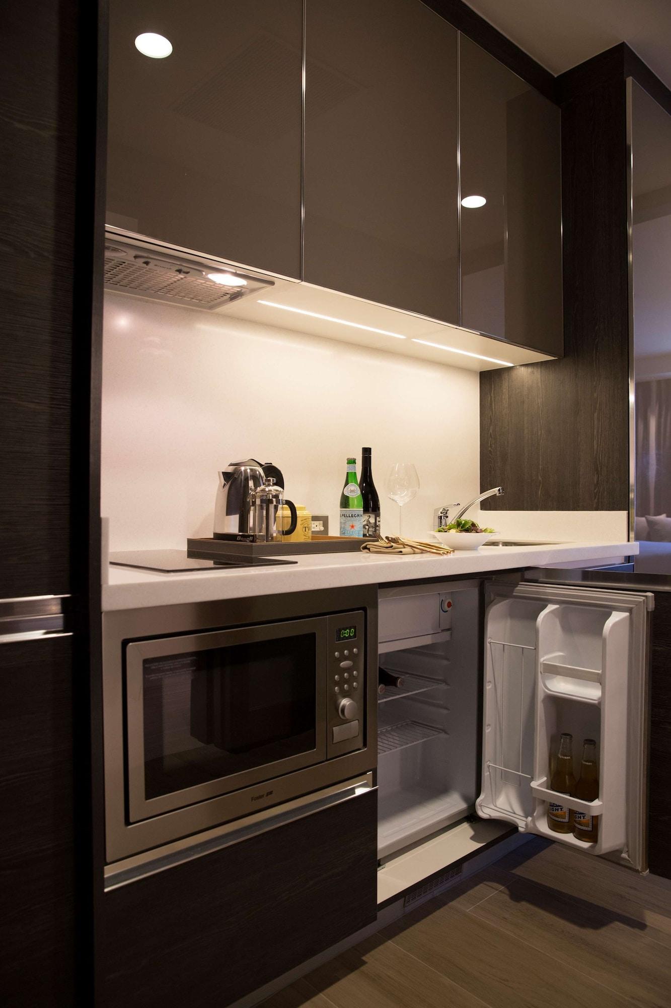 Makati Diamond Residences Макати Экстерьер фото A kitchen in a serviced apartment