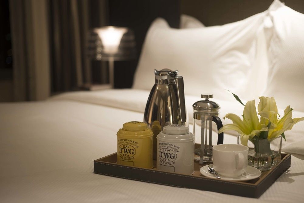 Makati Diamond Residences Макати Экстерьер фото A tray of TWG Tea products